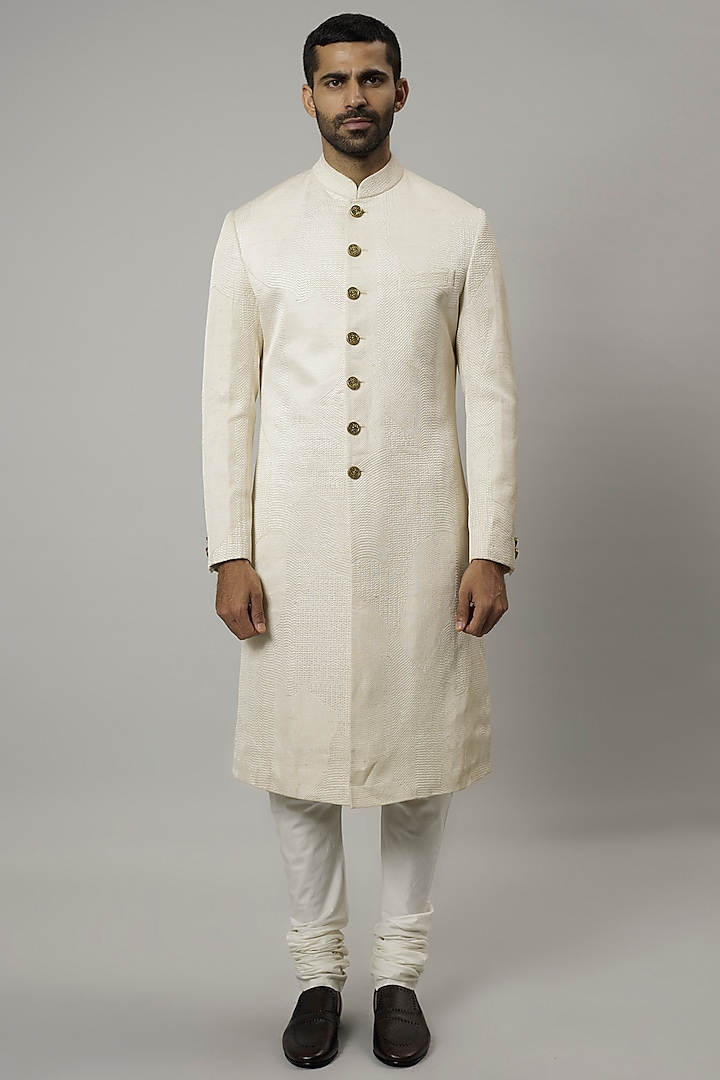 Ivory Raw Silk & Katan Silk Embroidered Sherwani Set by Divyam Mehta Men