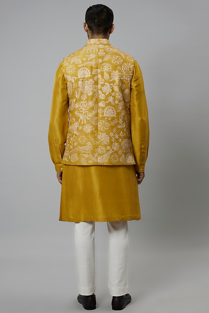 Haldi Yellow Raw Silk Embroidered Bundi Jacket Set by Divyam Mehta Men at Pernia's Pop Up Shop