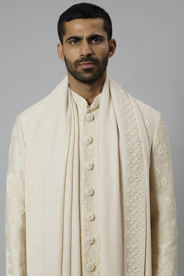 Ivory Raw Silk & Katan Silk Embroidered Groom Sherwani Set by Divyam Mehta Men at Pernia's Pop Up Shop