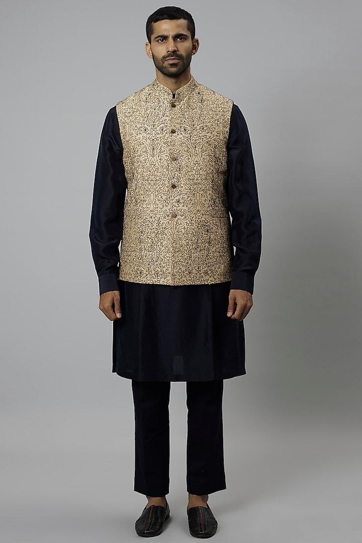 Beige Raw Silk Embroidered Bundi Jacket Set by Divyam Mehta Men