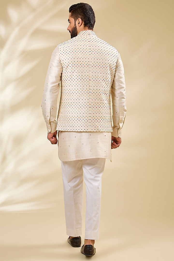 Ivory Raw Silk Embroidered Bundi Set by Divyam Mehta Men at Pernia's Pop Up Shop