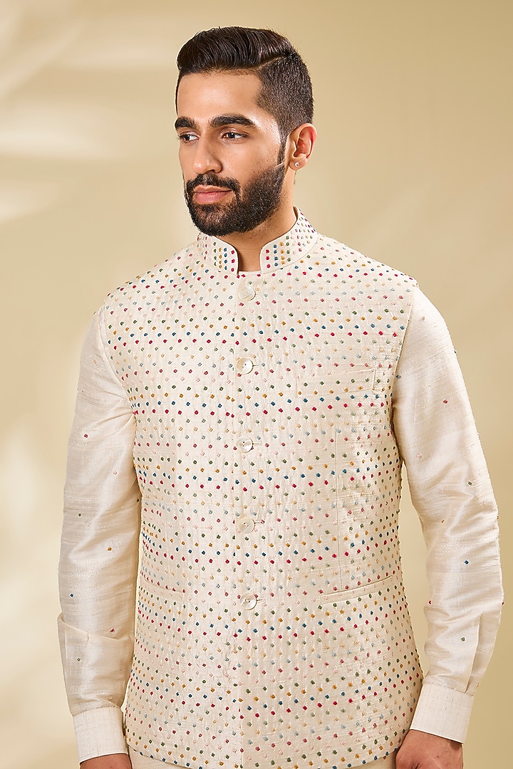 Ivory Raw Silk Embroidered Bundi Set by Divyam Mehta Men at Pernia's Pop Up Shop