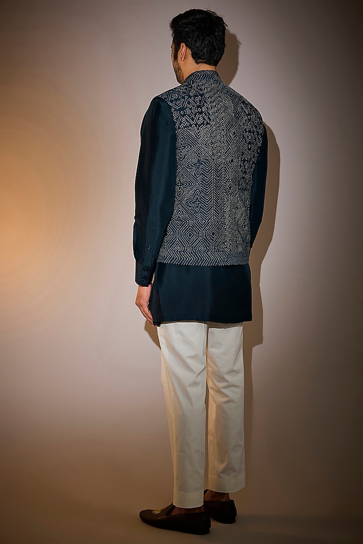 Dark Indigo Dupion Silk Embroidered Bundi Jacket Set by Divyam Mehta Men at Pernia's Pop Up Shop