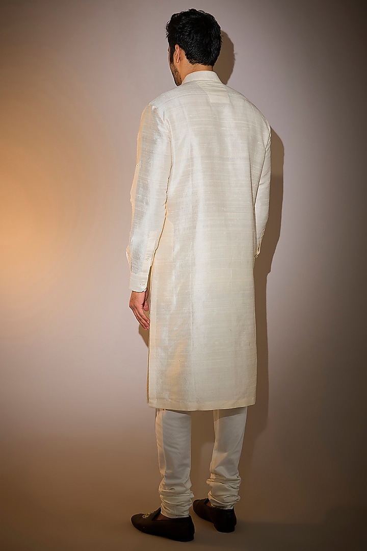Ivory Raw Silk & Katan Silk Embroidered Kurta Set by Divyam Mehta Men at Pernia's Pop Up Shop