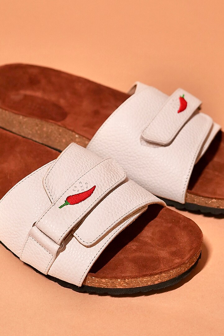 White & Brown Leather Embroidered Slip-Ons by Dmodot at Pernia's Pop Up Shop