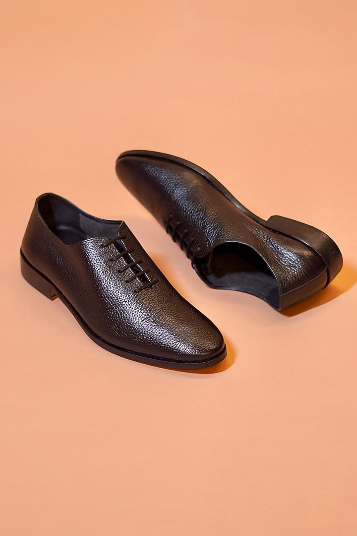 Black Textured Milled Leather Shoes by Dmodot at Pernia's Pop Up Shop