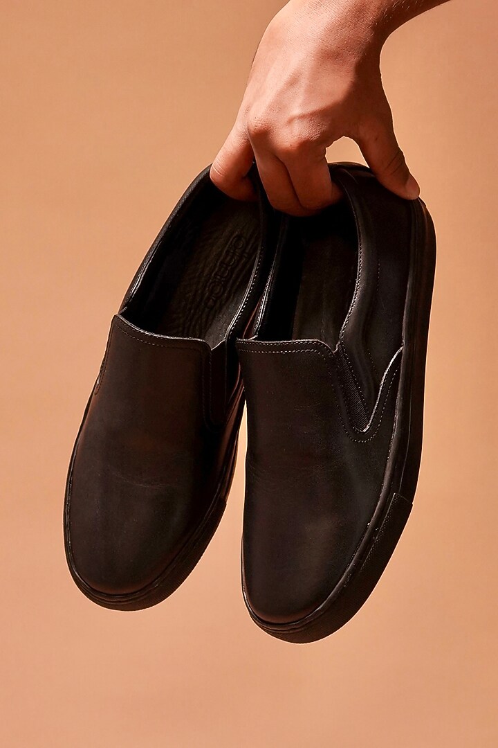 Black Full Grain Leather Slip-On Sneakers by Dmodot at Pernia's Pop Up Shop