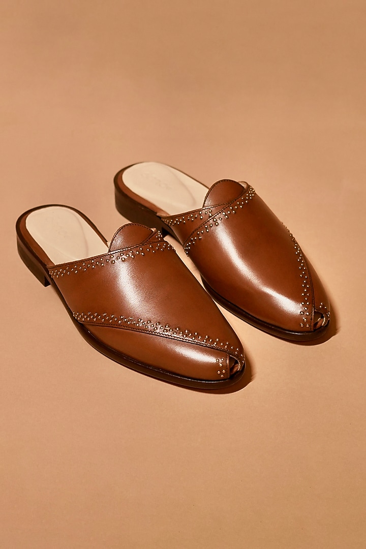 Brown Leather Rivet Embellished Peshawari Mules by Dmodot at Pernia's Pop Up Shop