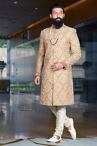 Royal Gold Raw Silk Embroidered Sherwani Set by DMODE