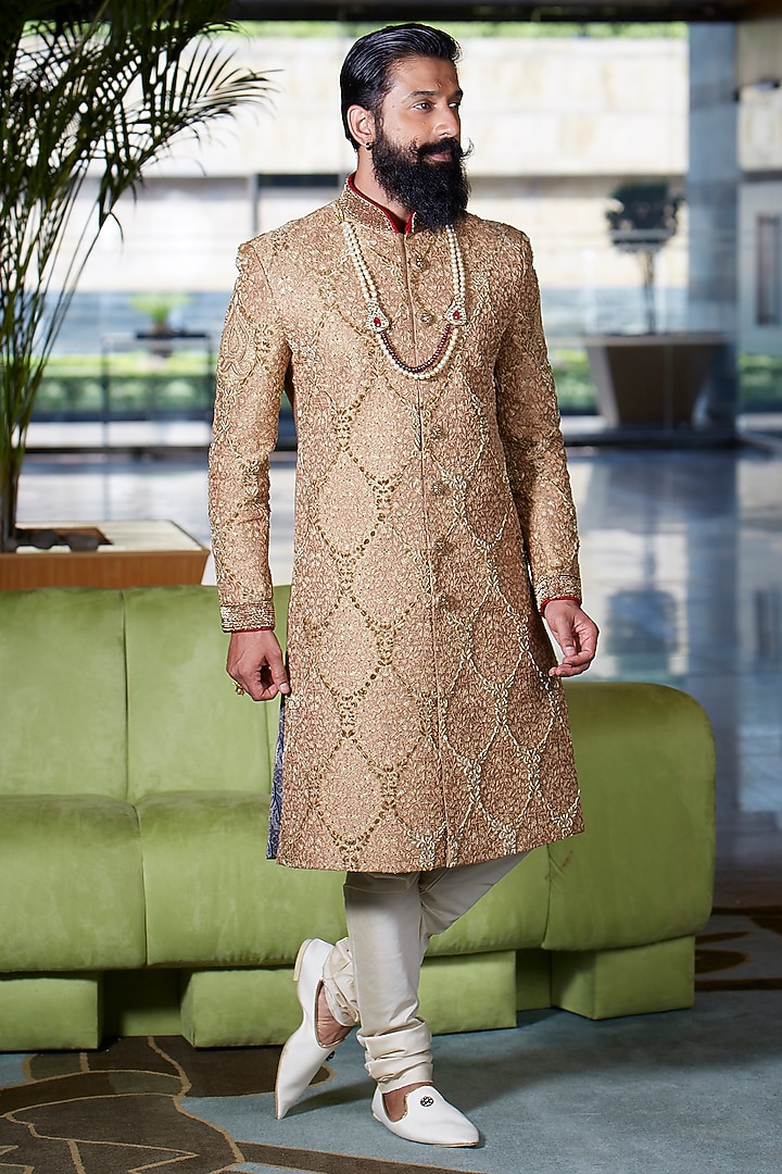 Royal Gold Raw Silk Embroidered Wedding Sherwani Set by DMODE at Pernia's Pop Up Shop