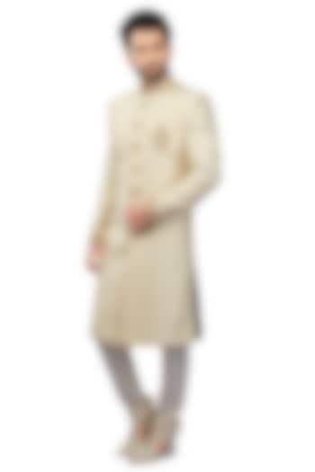 Cream Brocade French Knot Wedding Sherwani Set by DMODE at Pernia's Pop Up Shop