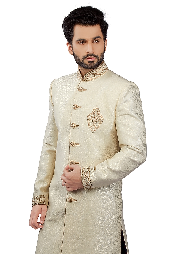 Cream Brocade French Knot Wedding Sherwani Set by DMODE at Pernia's Pop Up Shop