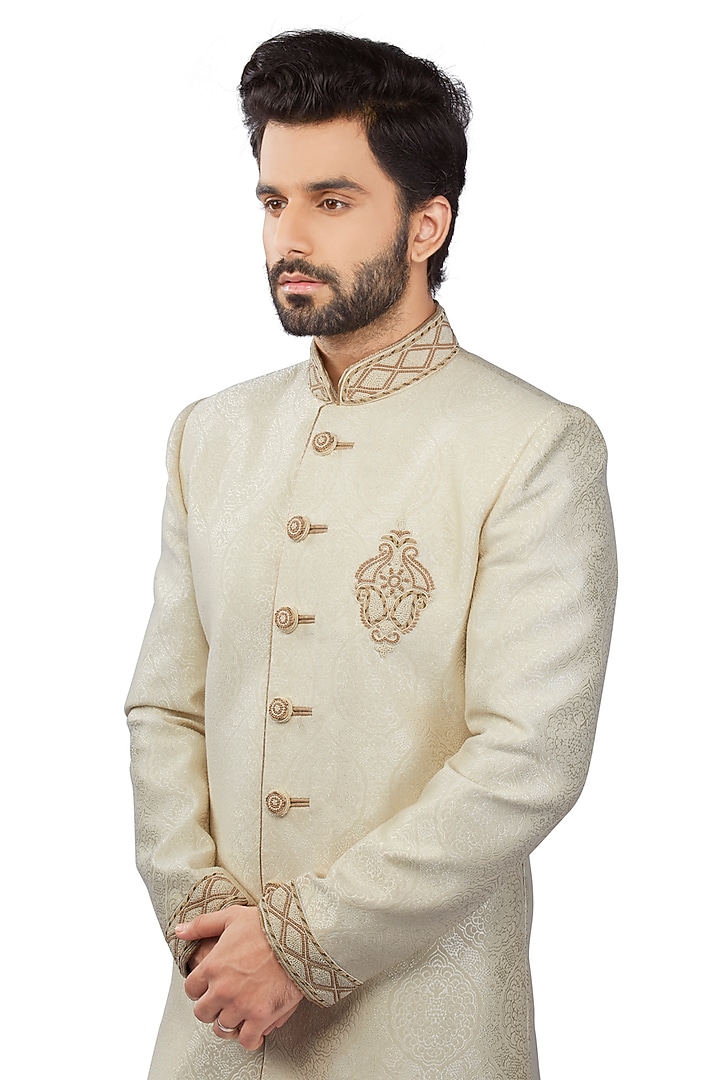 Cream Brocade French Knot Wedding Sherwani Set by DMODE at Pernia's Pop Up Shop
