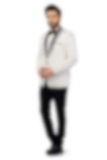 White Textured Suiting Tuxedo Set by DMODE at Pernia's Pop Up Shop