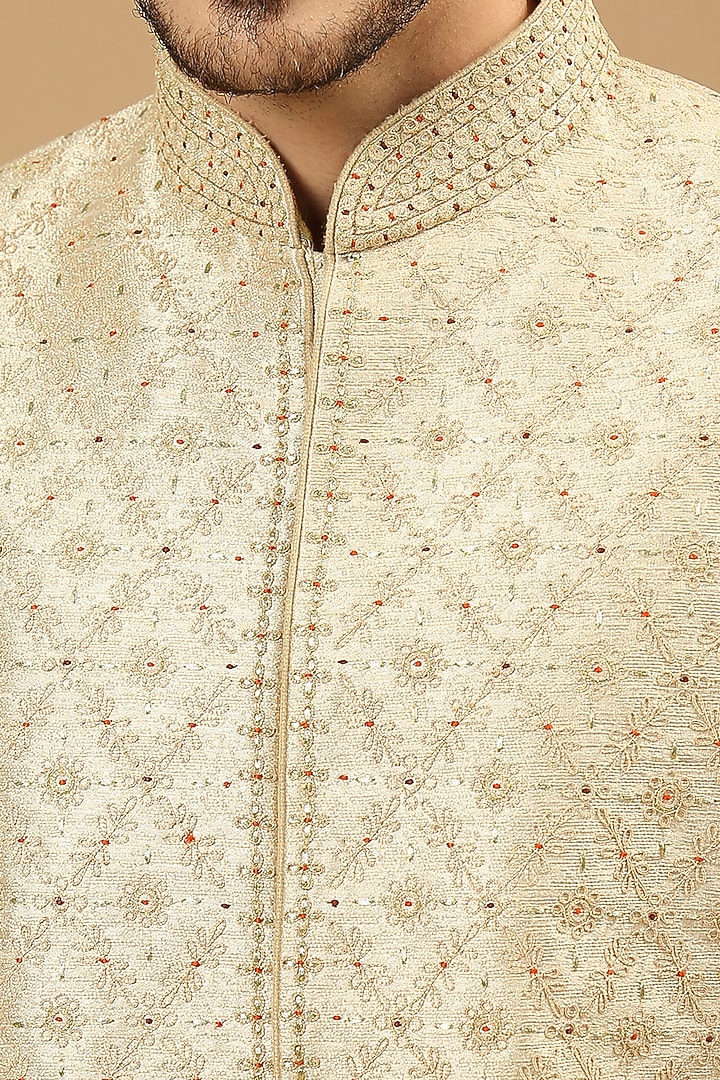 Biscuit Raw Silk Aari Work Wedding Sherwani Set by DMODE at Pernia's Pop Up Shop