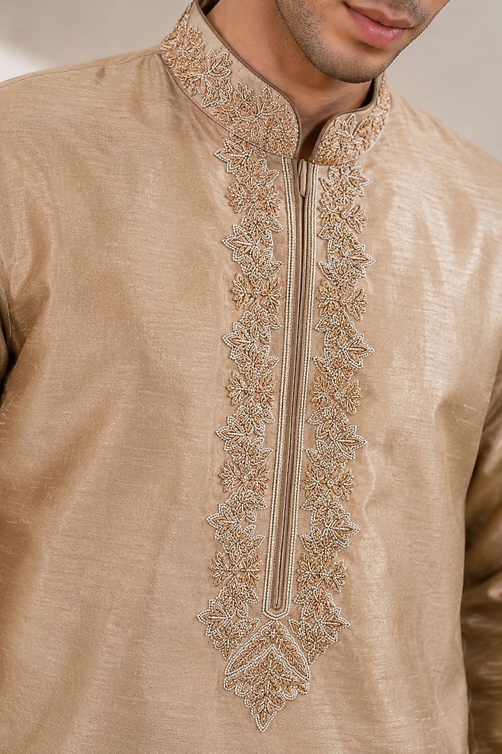 Sandstone-Colored Dupion Silk Floral Embroidered Kurta Set by DMODE at Pernia's Pop Up Shop
