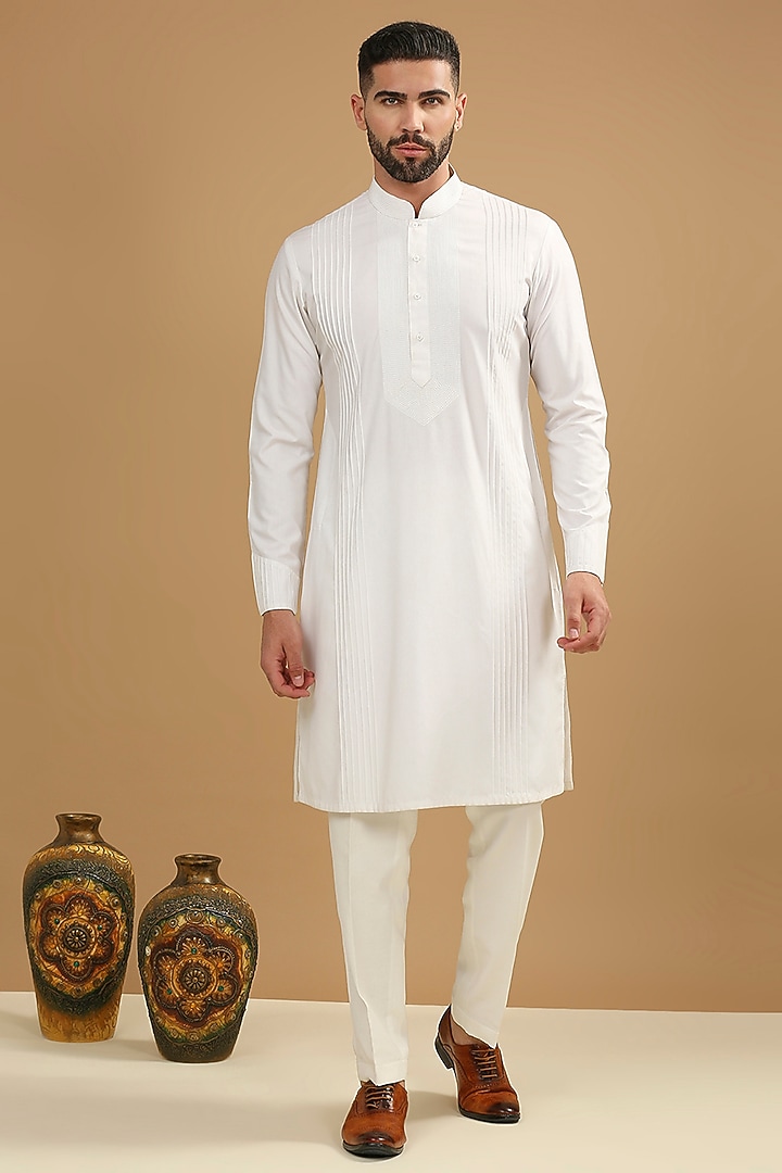 Yellow Dupion Silk Floral Embroidered Bundi Jacket Set by DMODE at Pernia's Pop Up Shop