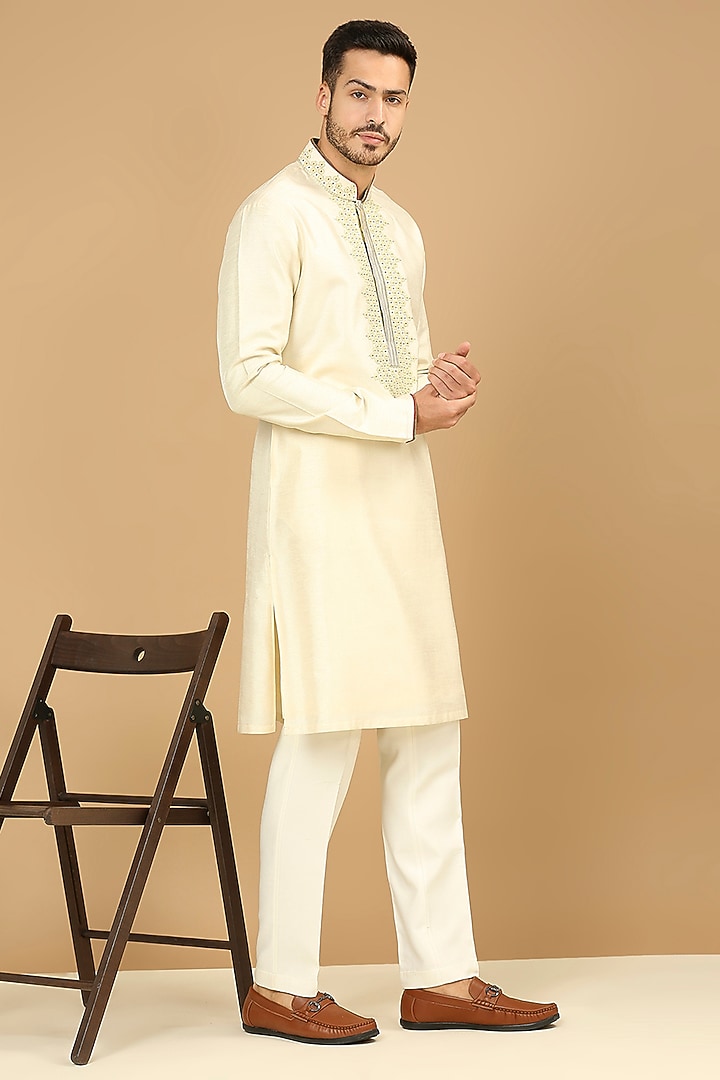 Cream Cotton Silk Floral Embroidered Kurta Set by DMODE at Pernia's Pop Up Shop