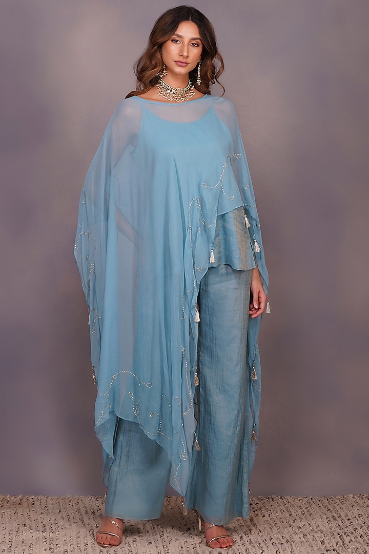 Turquoise Sequins Embroidered Cape Set by Devyani Mehrotra