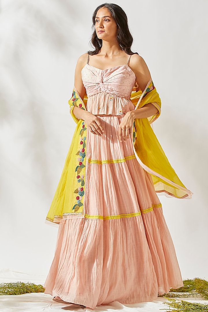 Blush Pink Embroidered & Tiered Lehenga Set by Devyani Mehrotra
