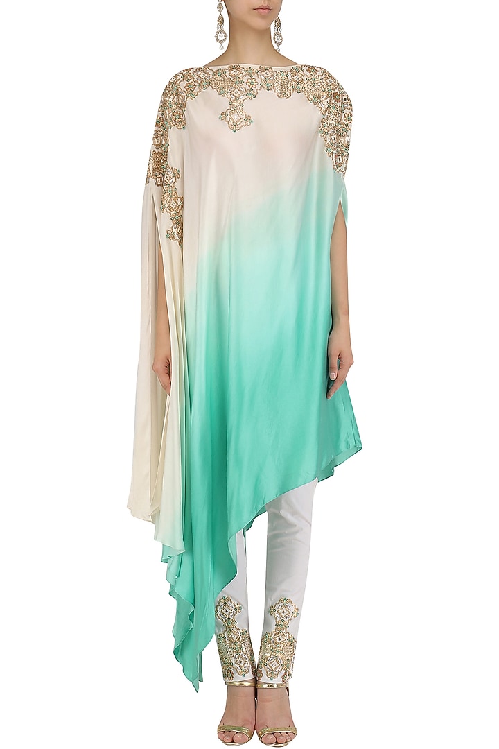 White and blue one shoulder kaftan and pants set available only at Pernia's Pop Up Shop.