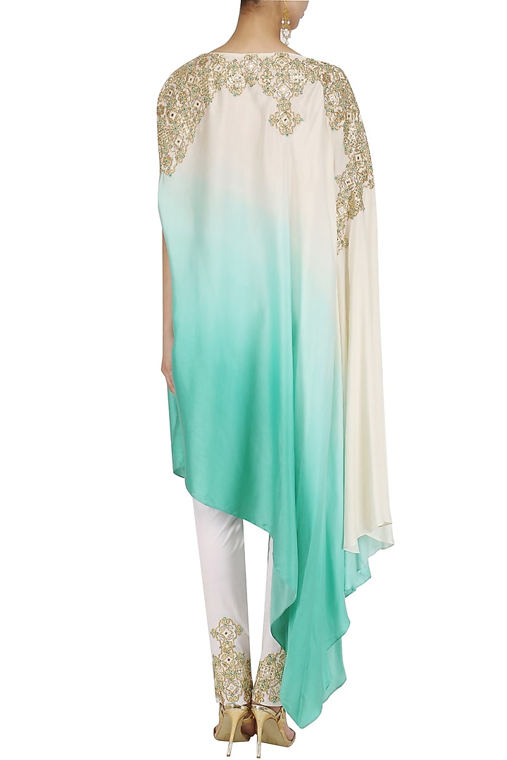 White and blue one shoulder kaftan and pants set available only at Pernia's Pop Up Shop.