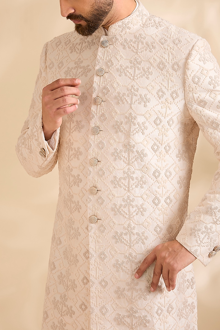 Vanilla White Raw Silk Embroidered Groom Sherwani Set by Divyam Mehta Men at Pernia's Pop Up Shop