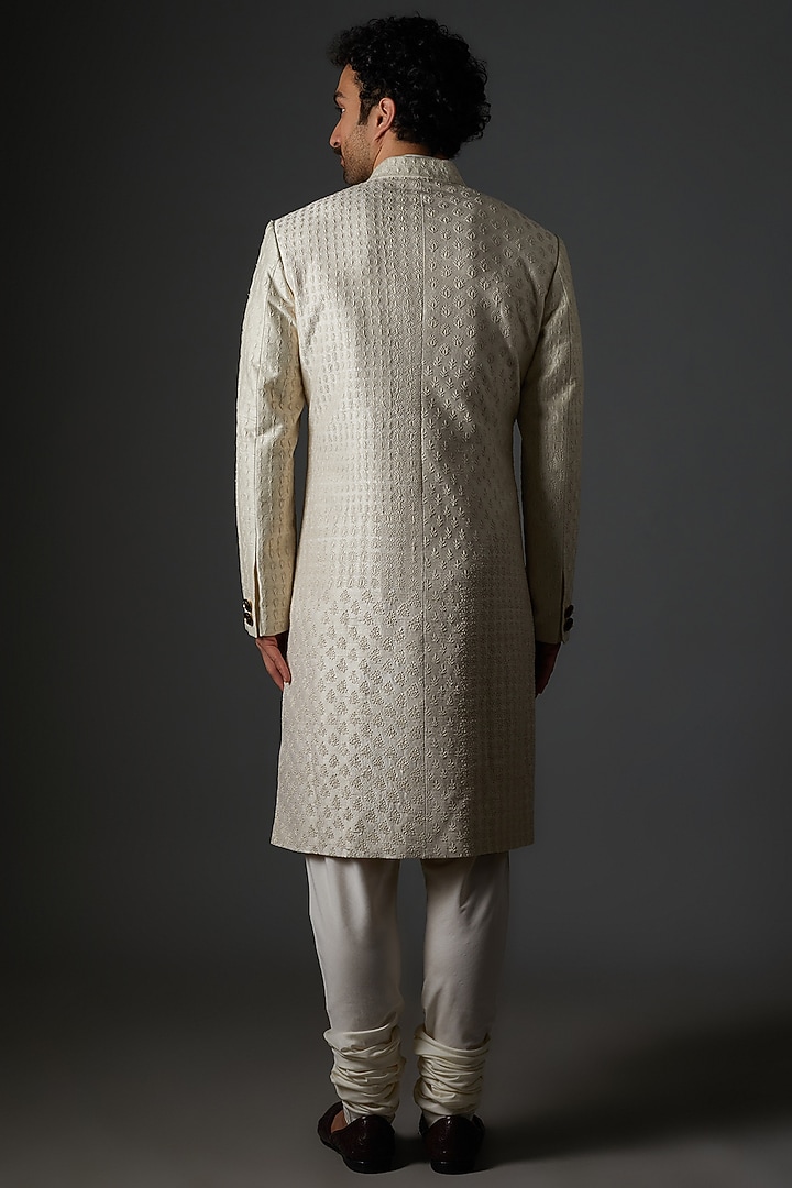 Ivory Raw SIlk Chikankari Embroidered Sherwanai Set by Divyam Mehta Men at Pernia's Pop Up Shop