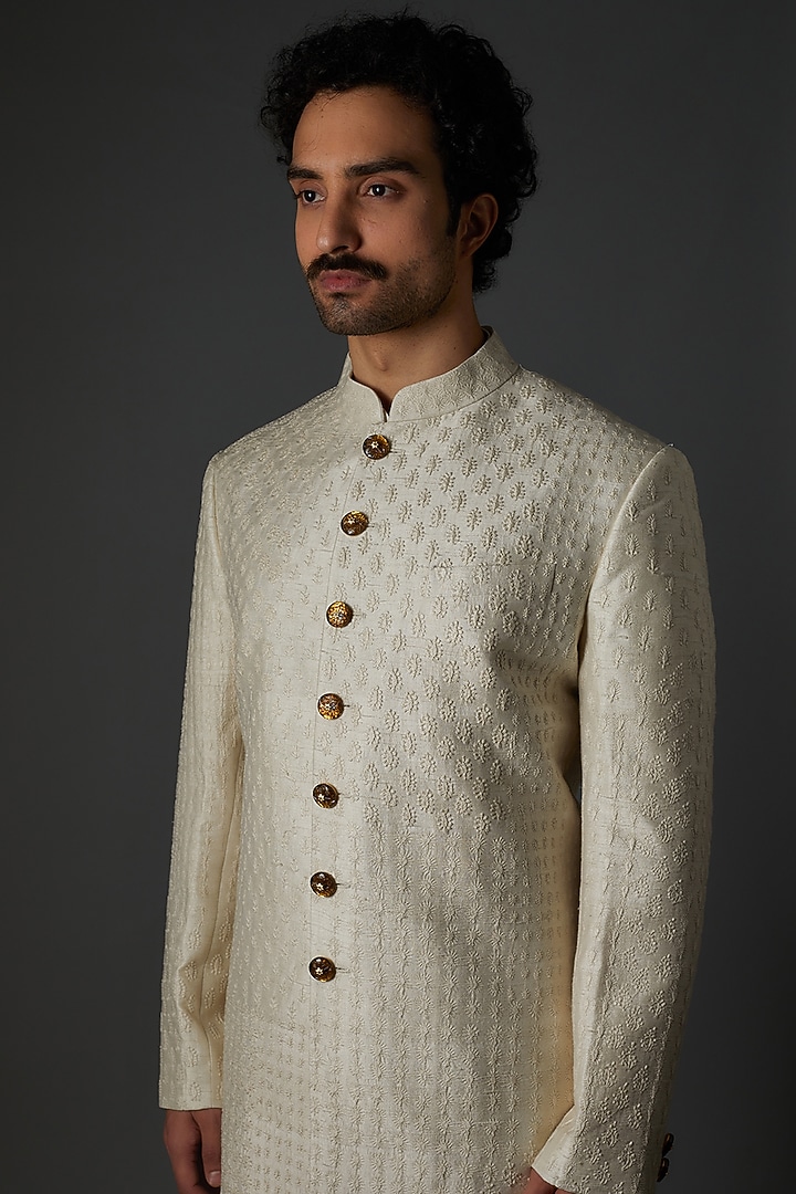 Ivory Raw SIlk Chikankari Embroidered Sherwanai Set by Divyam Mehta Men at Pernia's Pop Up Shop