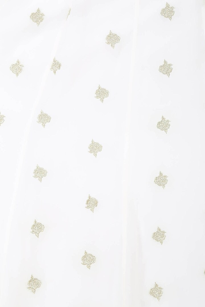White floral embroidered jacket with bustier and panelled skirt available only at Pernia's Pop Up Shop.