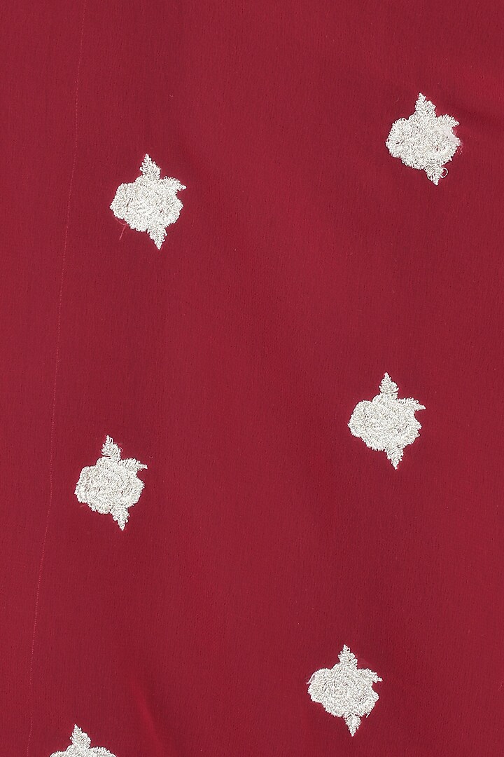 Red floral embroidered cape with black palazzo pants available only at Pernia's Pop Up Shop.
