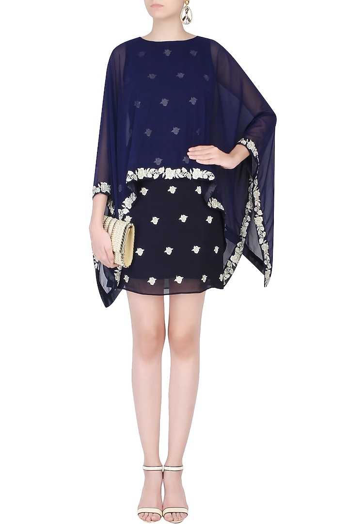 Blue floral embroidered dress with asymmetric cape available only at Pernia's Pop Up Shop.