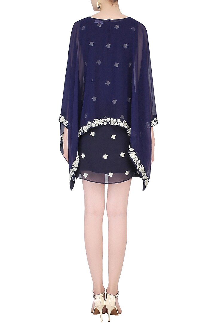 Blue floral embroidered dress with asymmetric cape available only at Pernia's Pop Up Shop.