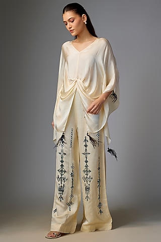 Melo-Colored Blended Linen Cutdana Embroidered Trousers by Dilnaz Karbhary