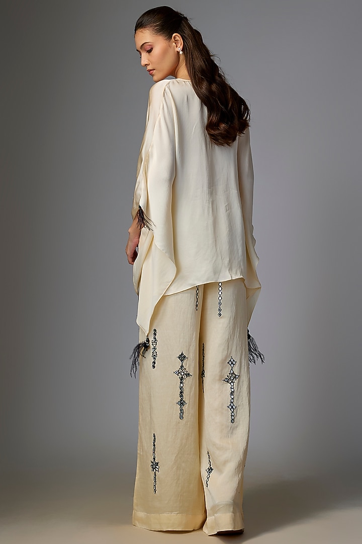 Melo-Colored Blended Linen Cutdana Embroidered Trousers by Dilnaz Karbhary at Pernia's Pop Up Shop