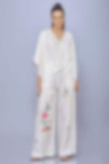 Ivory Blended Satin Linen Floral Trousers by Dilnaz Karbhary at Pernia's Pop Up Shop