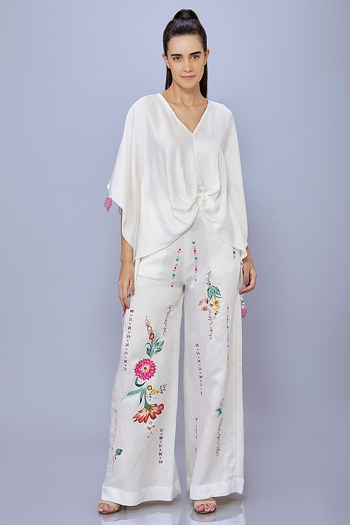 Ivory Blended Satin Linen Floral Trousers by Dilnaz Karbhary at Pernia's Pop Up Shop