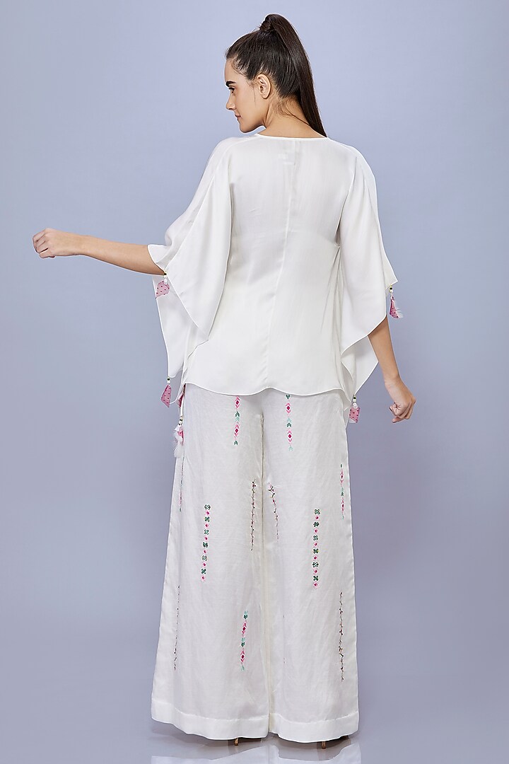 Ivory Blended Satin Linen Floral Trousers by Dilnaz Karbhary at Pernia's Pop Up Shop