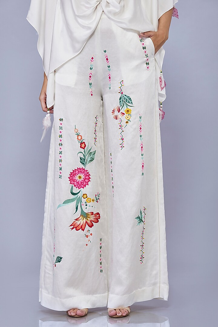 Ivory Blended Satin Linen Floral Trousers by Dilnaz Karbhary at Pernia's Pop Up Shop