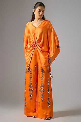 Saffron Blended Satin Mirror Work Trousers by Dilnaz Karbhary