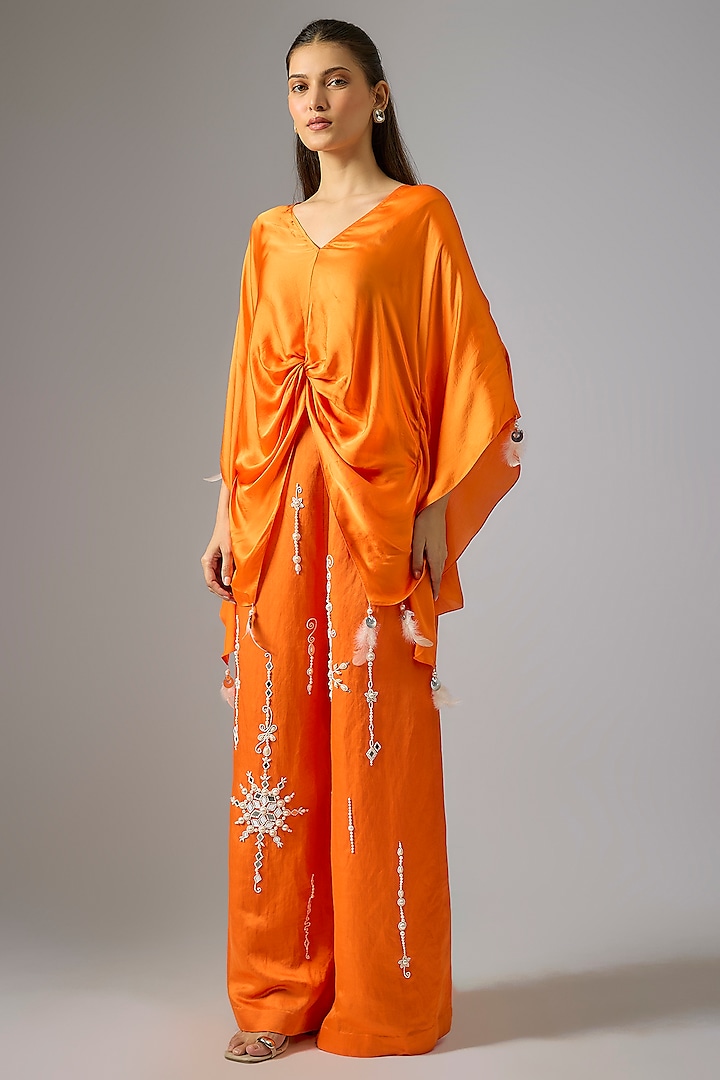 Saffron Blended Linen Pearl Embroidered Trousers by Dilnaz Karbhary at Pernia's Pop Up Shop
