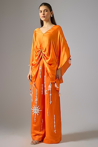 Saffron Blended Linen Pearl Embroidered Trousers by Dilnaz Karbhary