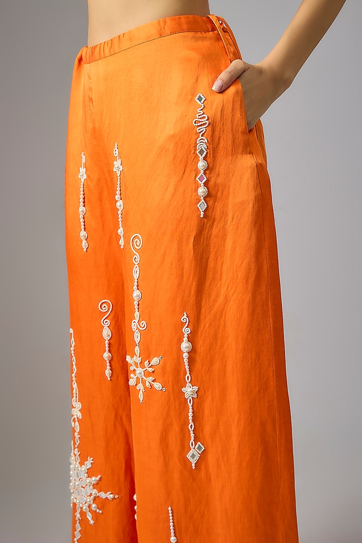 Saffron Blended Linen Pearl Embroidered Trousers by Dilnaz Karbhary at Pernia's Pop Up Shop