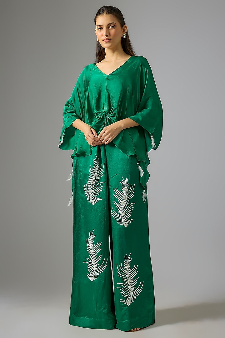 Emerald Green Blended Linen Embellished Trousers by Dilnaz Karbhary at Pernia's Pop Up Shop