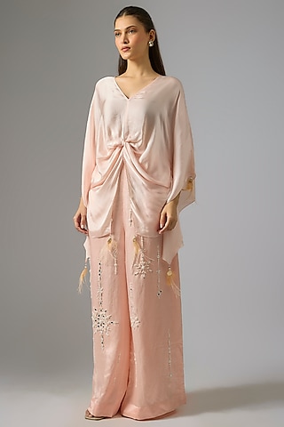 Light Peach Blended Linen Embellished Trousers by Dilnaz Karbhary