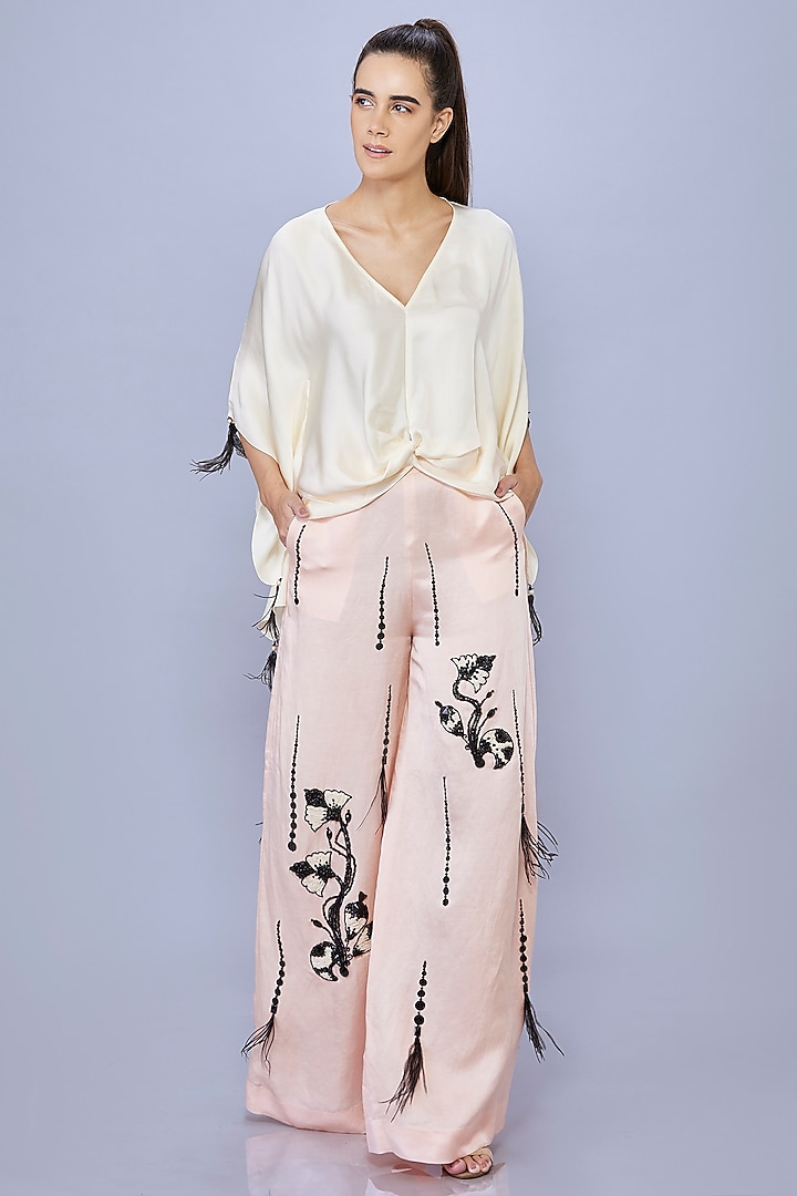 Light Peach Blended Satin Linen Motif Embroidered Trousers by Dilnaz Karbhary at Pernia's Pop Up Shop