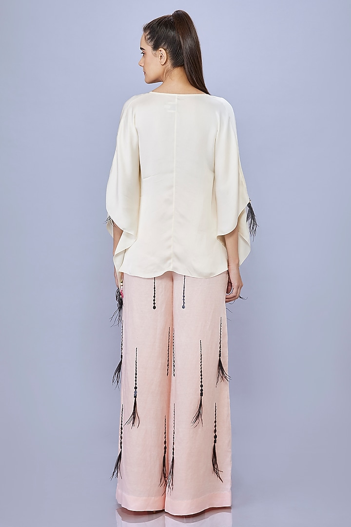 Light Peach Blended Satin Linen Motif Embroidered Trousers by Dilnaz Karbhary at Pernia's Pop Up Shop