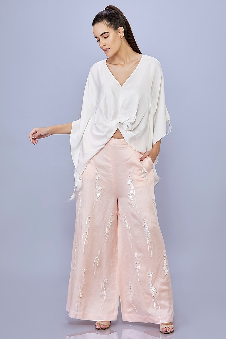 Light Peach Blended Satin Linen Pearl Embroidered Trousers by Dilnaz Karbhary at Pernia's Pop Up Shop