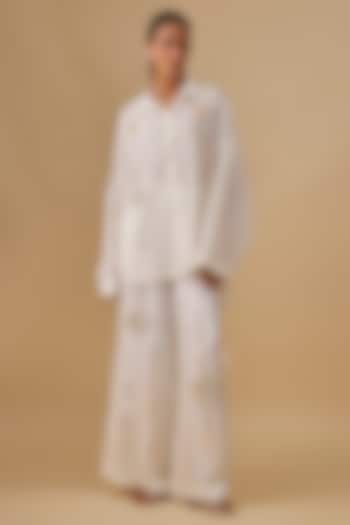 Ivory Blended Linen Embroidered Trousers by Dilnaz Karbhary at Pernia's Pop Up Shop
