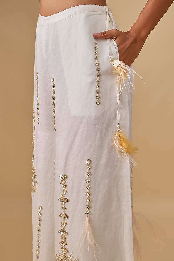 Ivory Blended Linen Embroidered Trousers by Dilnaz Karbhary at Pernia's Pop Up Shop